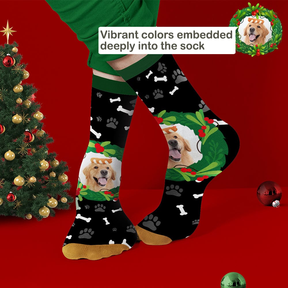 Black personalised photo pet socks featuring a clear pet portrait and festive mistletoe & bone pattern – unique Christmas present