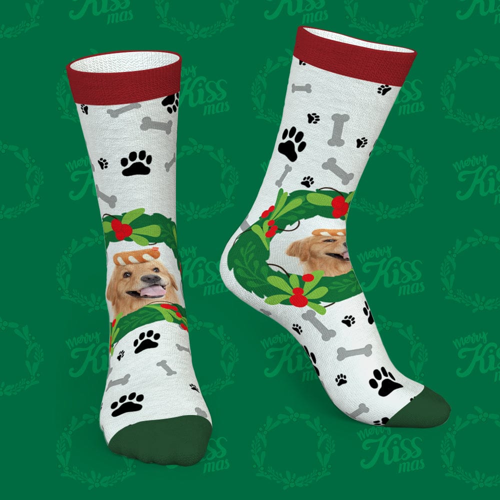 Detailed shot of red personalised photo pet socks showing a clear pet image with mistletoe & bone pattern – great festive stocking gift