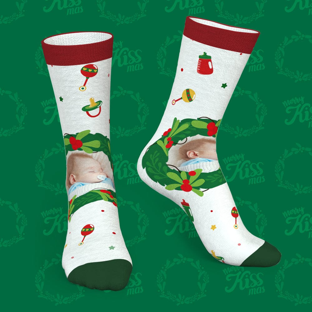 Close-up of red personalised photo socks highlighting feeding bottle and mistletoe icons, personalised with family photo or text — thoughtful gift for mum or wife