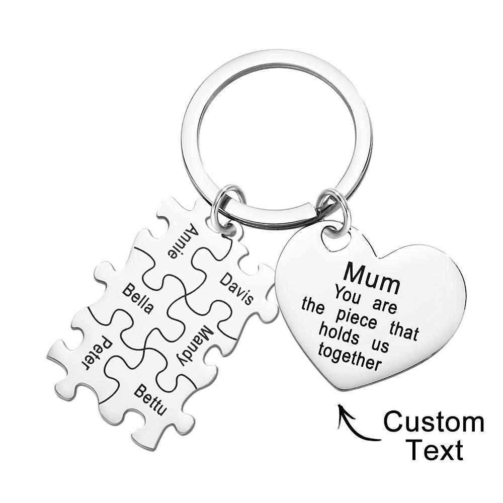 Personalised engraved heart keyring held in hand to show scale — custom heart keychain ideal for Mother's Day and anniversaries