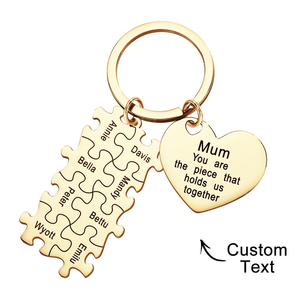 Personalised engraved puzzle heart keyring beside a ruler for size reference — shows dimensions of the custom heart keychain