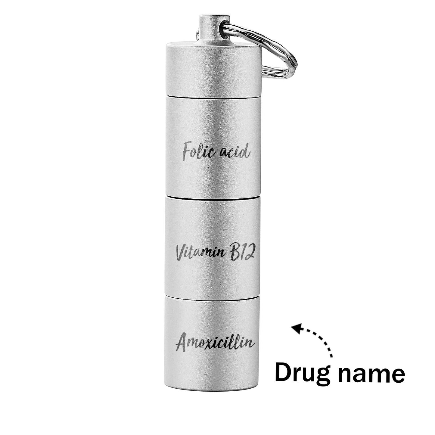 Close‑up of personalised engraving on a pill box layer — engraved keyring personalised keychain ideal as a thoughtful gift