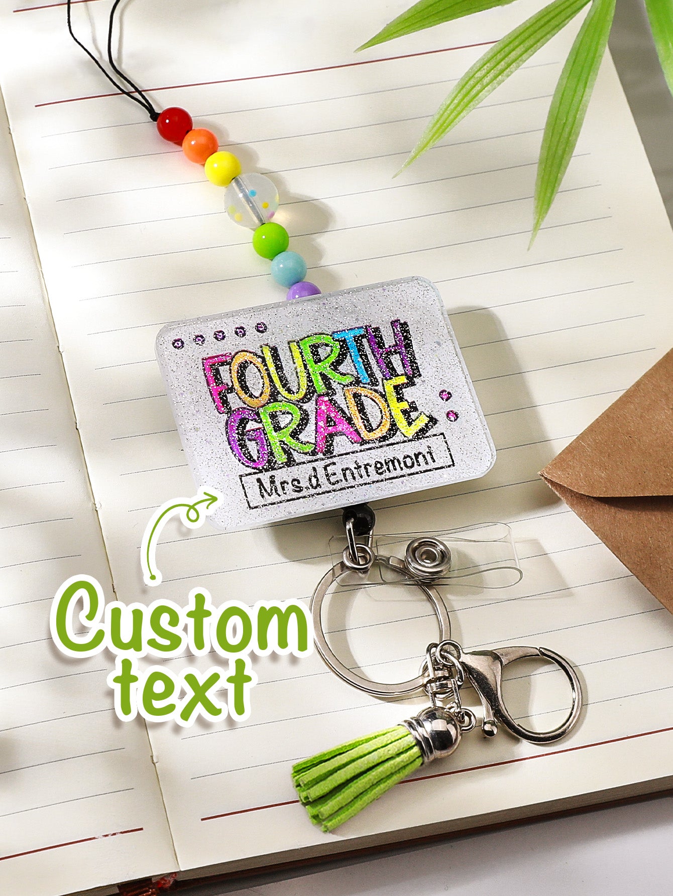 Personalised name charm attached to lower ring with keys — functional personalised teacher lanyard