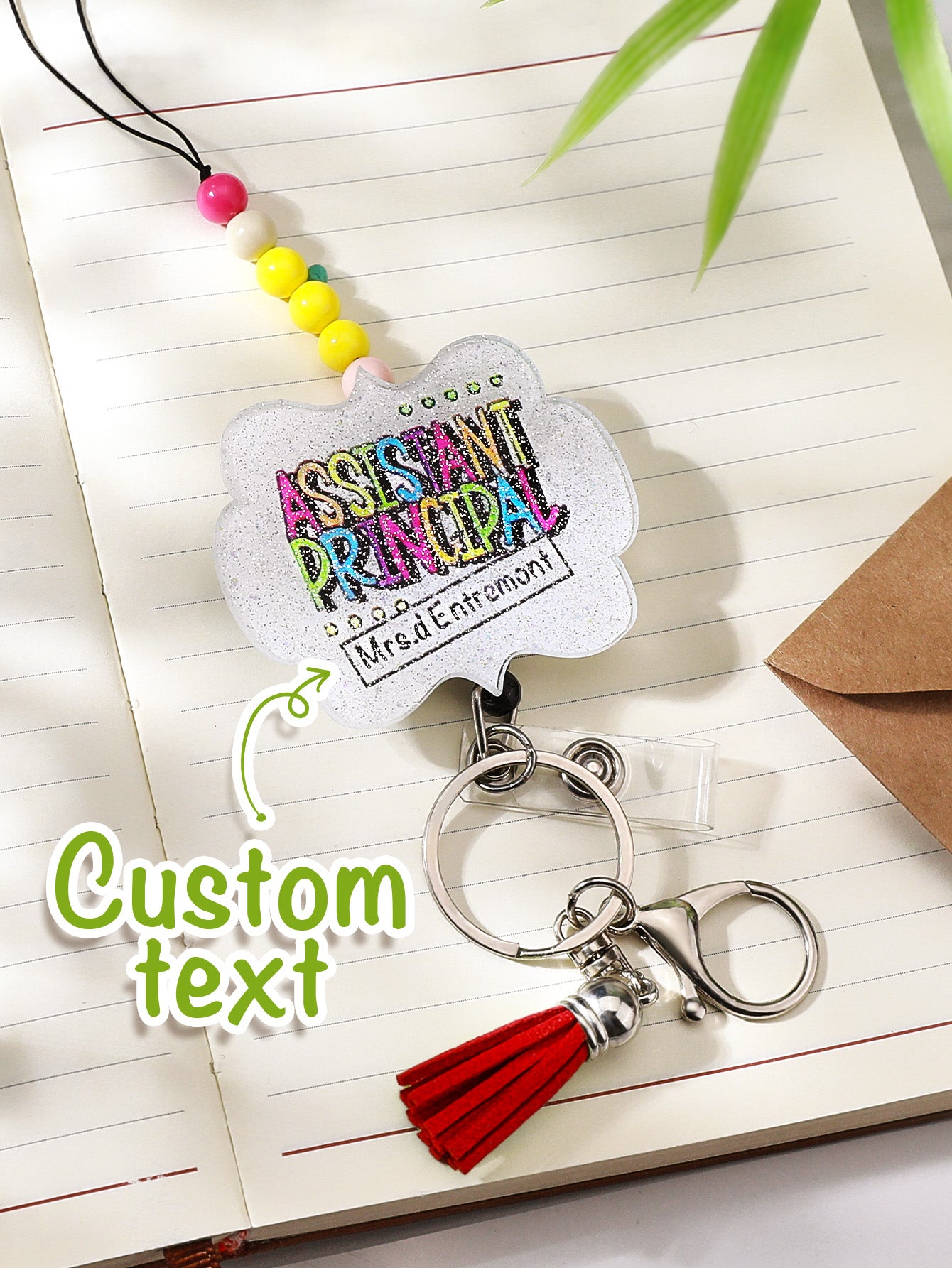 Tassel and charm alignment detail on personalised glitter lanyard — stylish personalised teacher accessory