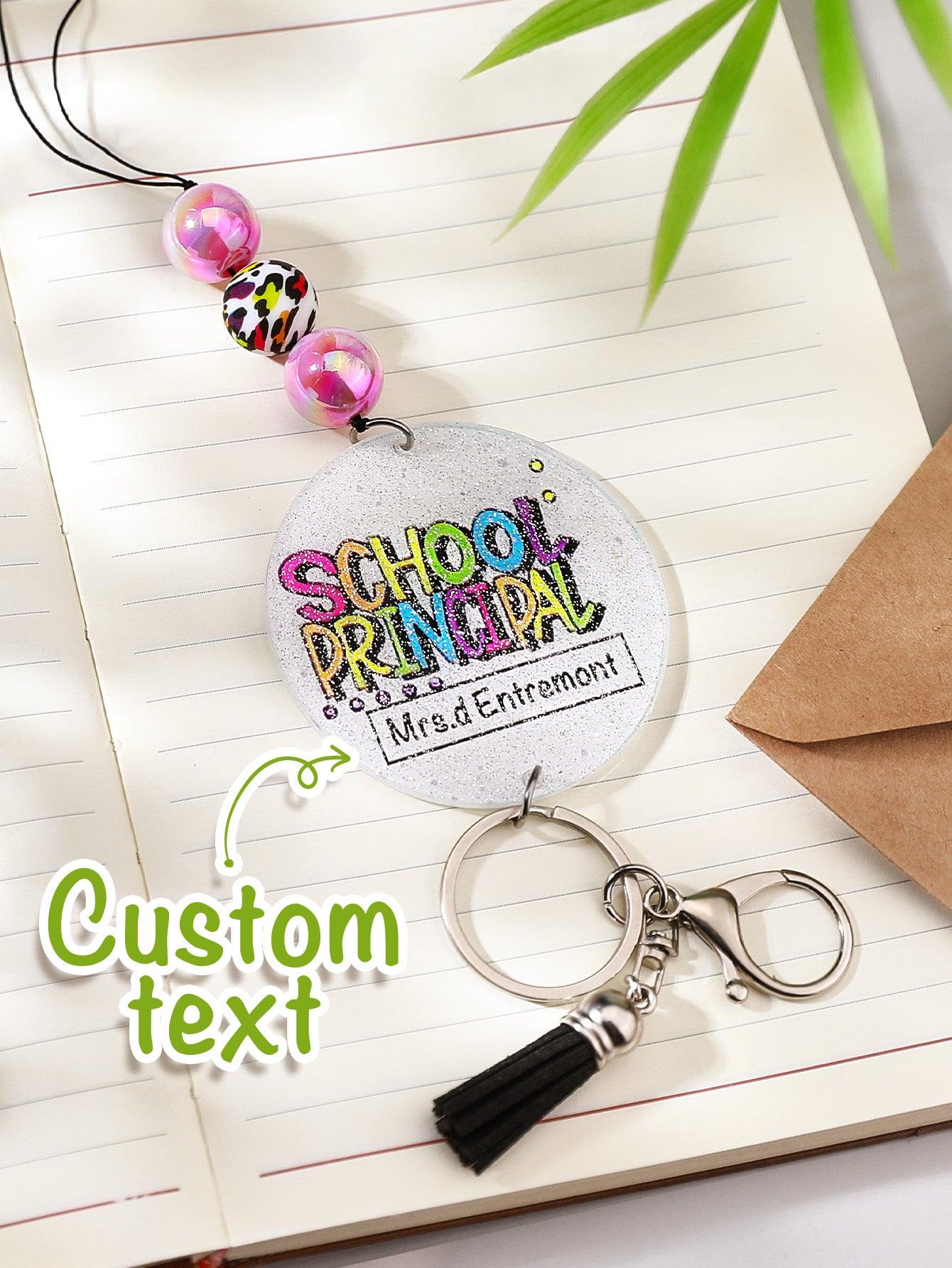 Personalised name plate shown with clear legible lettering on glitter lanyard — custom teacher lanyard close-up