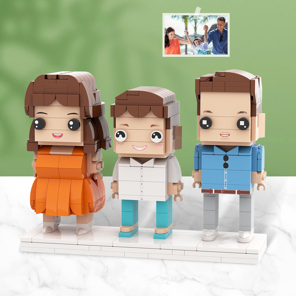 Close-up of three personalised brick minifigures showing customised hairstyles, facial expressions and clothing — customisable brick figures
