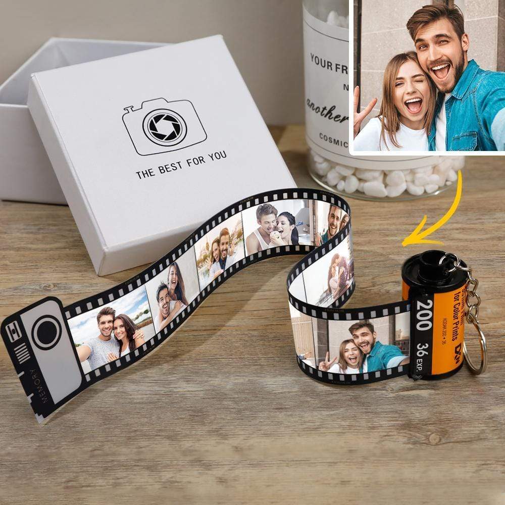 Close-up of personalised film frames on the camera film roll keyring showing multiple photos – perfect personalised photo gift