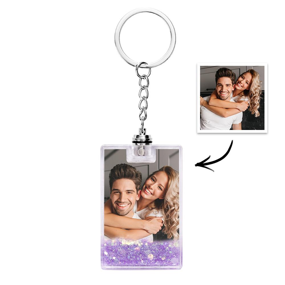 Hand-held personalised photo keyring showing scale and the gentle illuminated glow accentuating the custom image