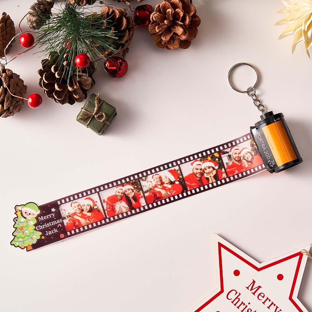 Camera film roll photo keyring hanging from a handbag — personalised photo keychain and compact keepsake gift