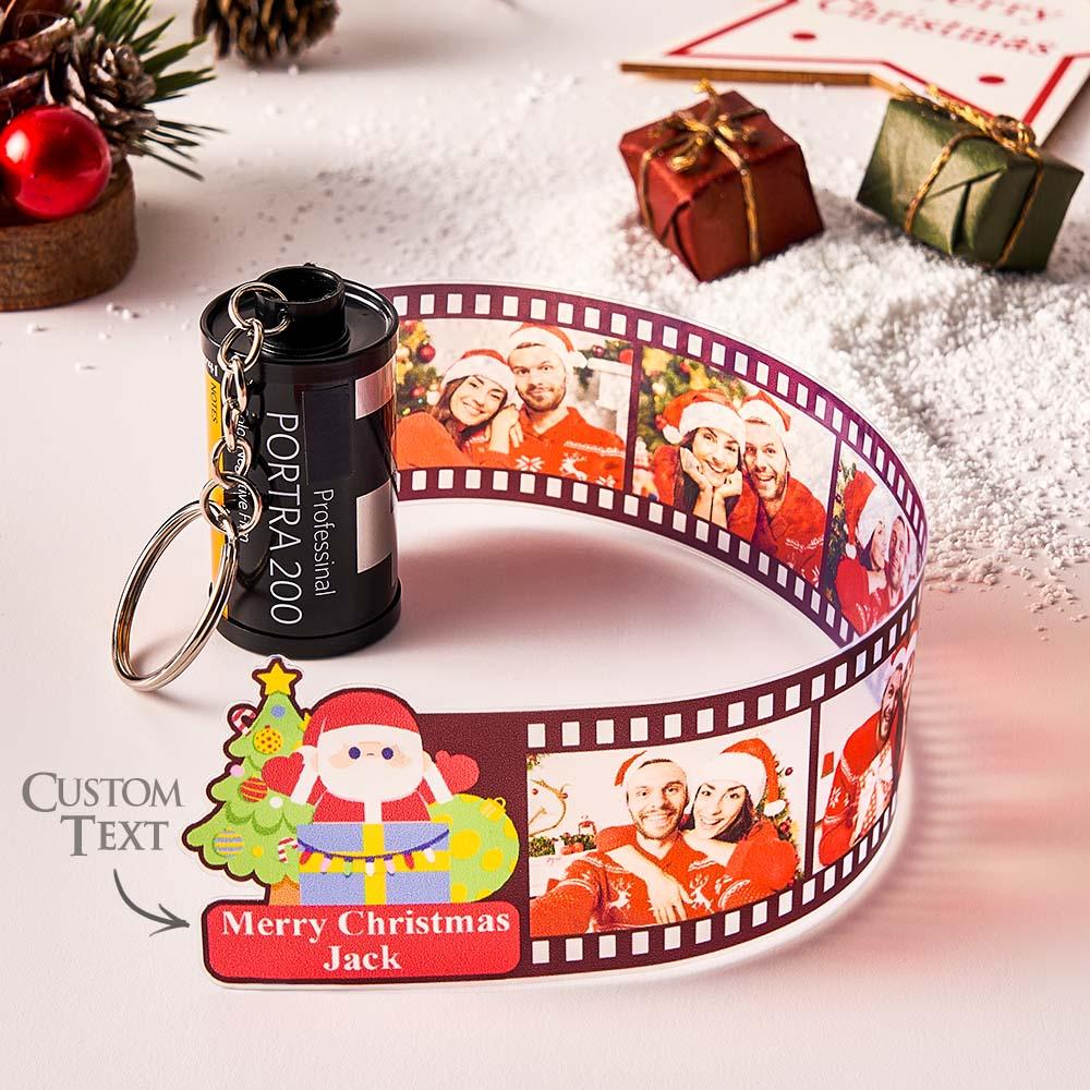 Camera film roll photo keyring hanging from a handbag — personalised photo keychain and compact keepsake gift