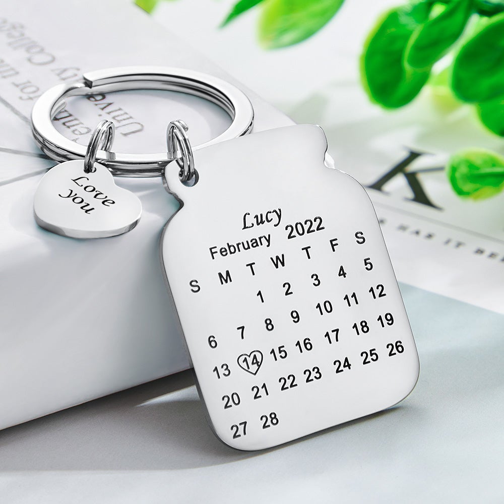 Compact stainless steel calendar keyring shown on keys and a bag, corrosion-resistant personalised anniversary keepsake with mirror finish