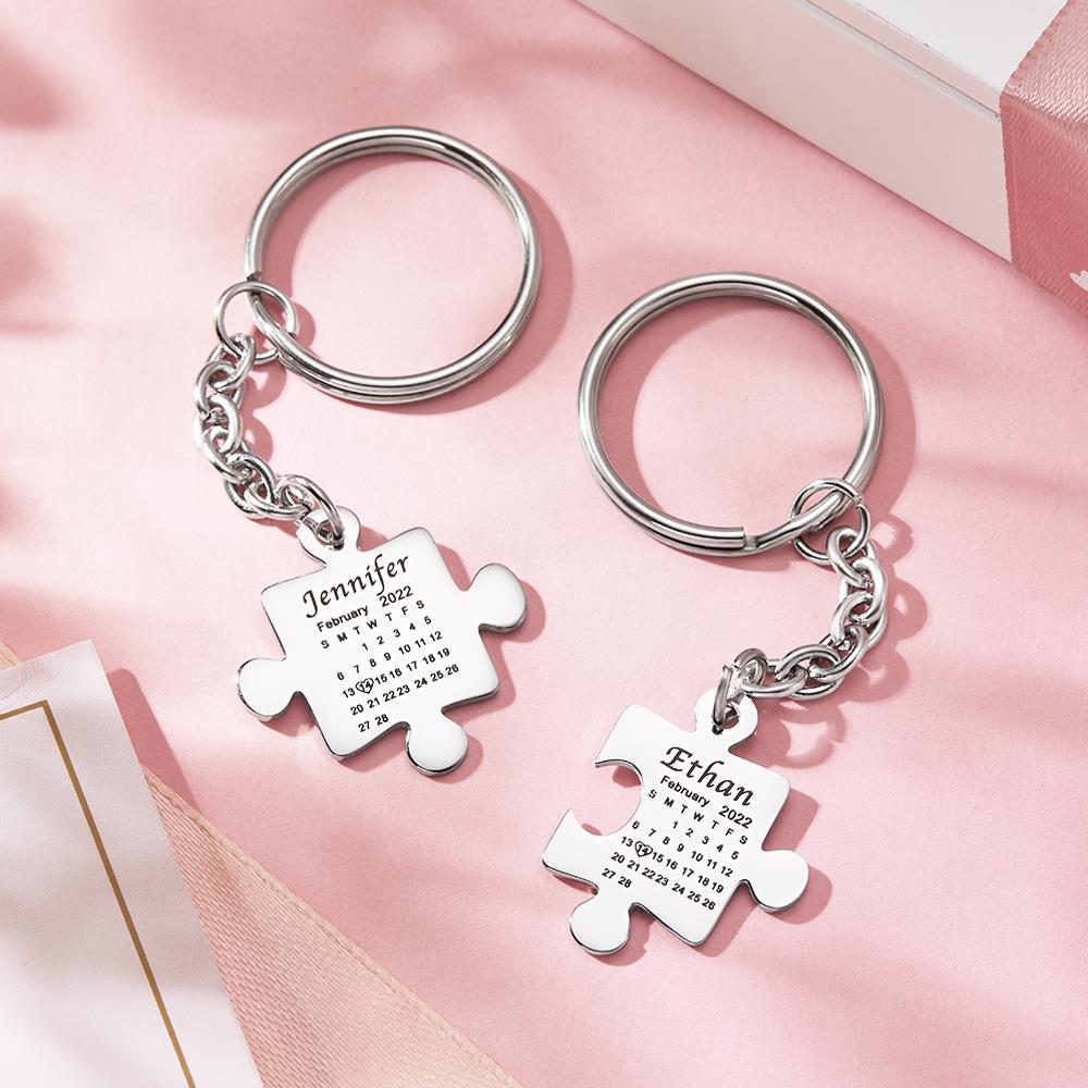 Stainless steel puzzle keyring showing durable finish and detailed engraved calendar, a bespoke couples keyring to celebrate a special date