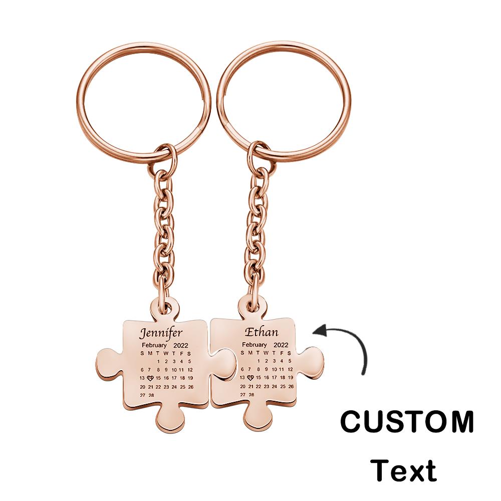 Close-up of precision engraving on stainless steel puzzle keyring showing personalised calendar date and short message for couples