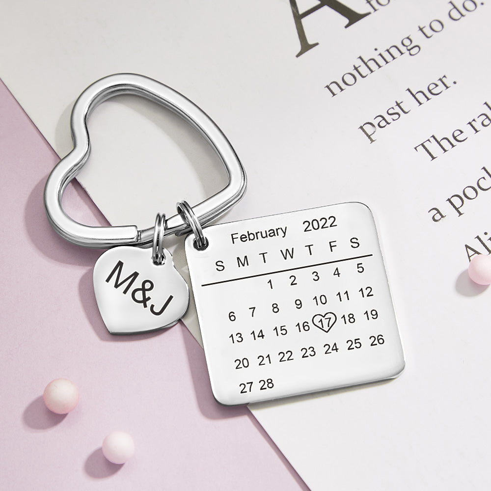 Personalised rose gold heart calendar keyring close-up showing engraved date — romantic anniversary keepsake