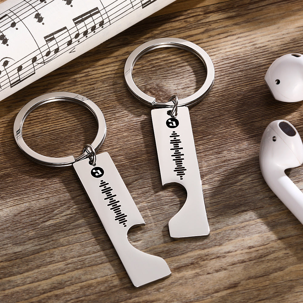Pair of personalised scannable song keychains on sturdy split rings, durable stainless steel perfect for couples and gifts