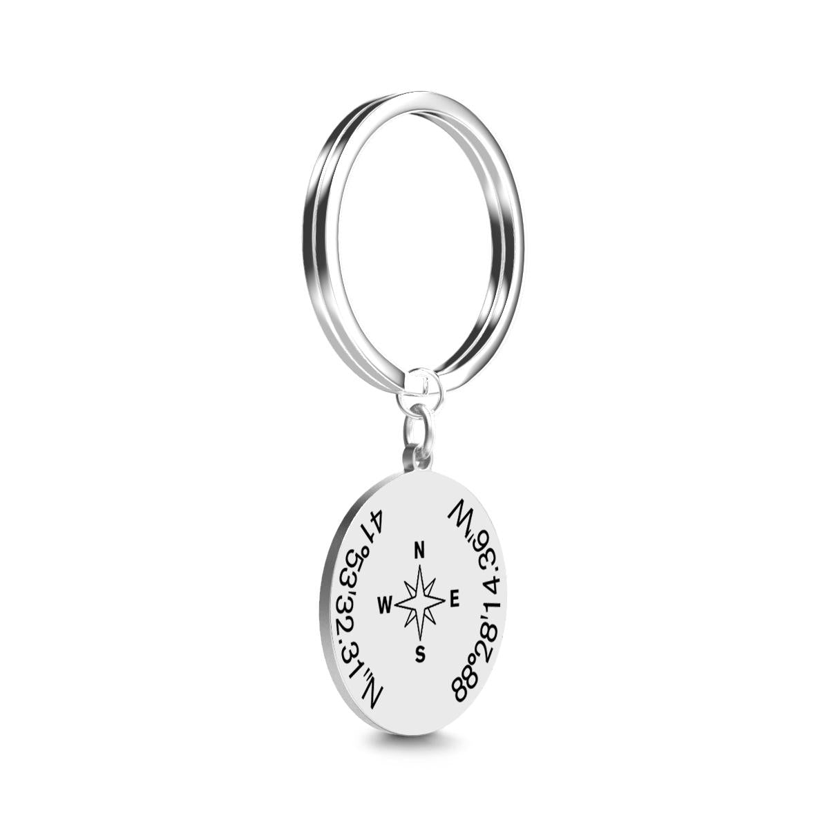 Custom latitude and longitude keyring attached to keys — engraved compass keychain keepsake for travellers