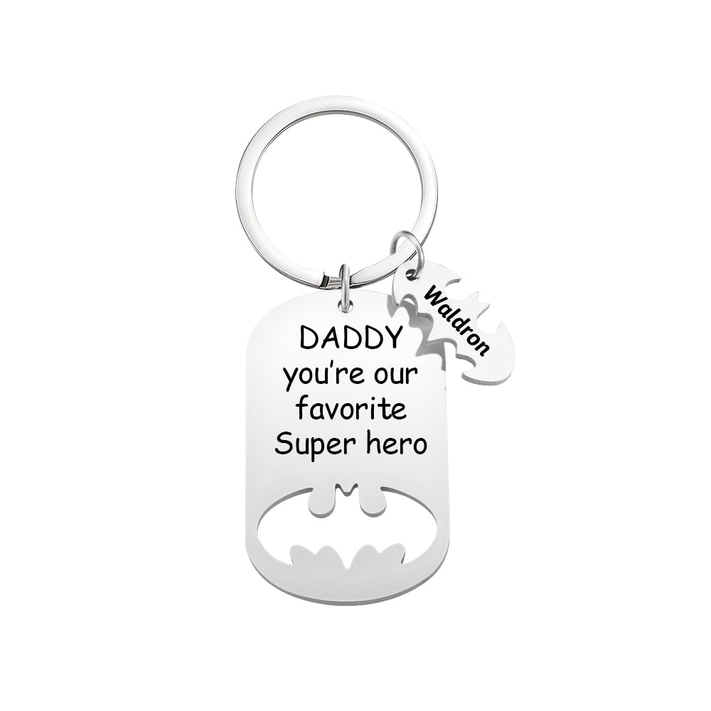 Angled view of engraved Personalised Superhero Daddy Keyring, stainless steel keepsake perfect for Father's Day or birthday
