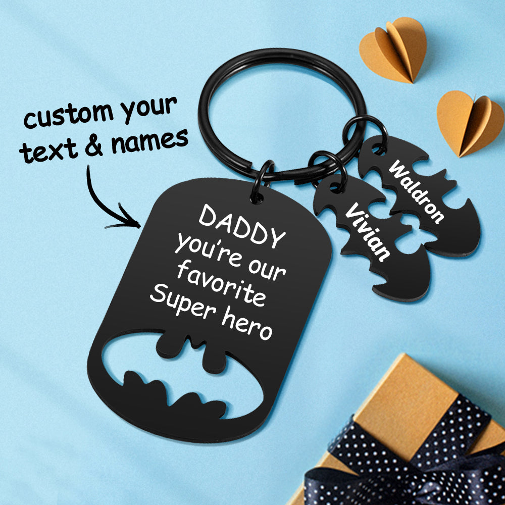 Set of stainless steel personalised keyrings featuring children's names, a thoughtful gift for father or grandpa