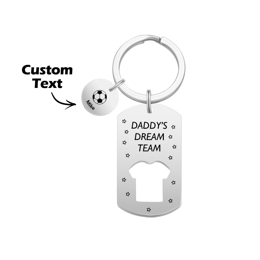 Front view of 'Daddy's Dream Team' engraved football charm and custom name bar on stainless steel keyring – personalised gift for dad