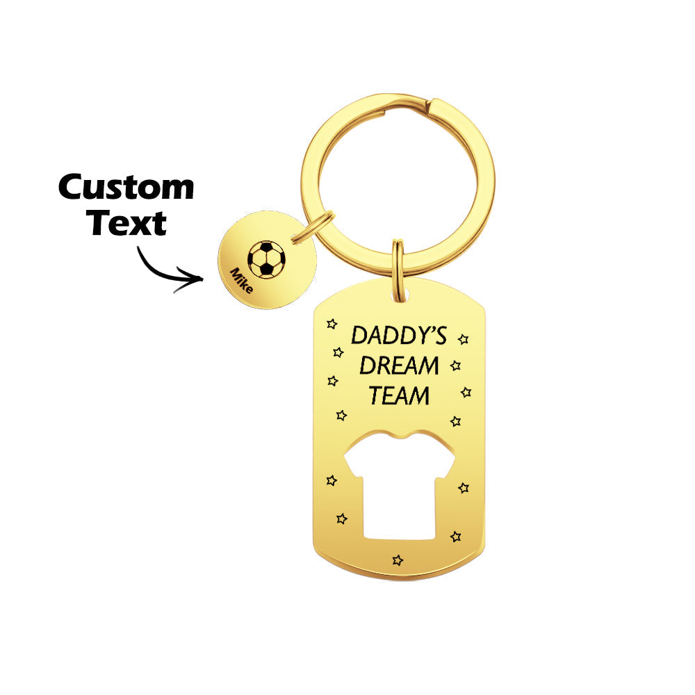 Stylish presentation of engraved name bars beside a football charm showing hand-stamped lettering – ideal Father's Day keepsake