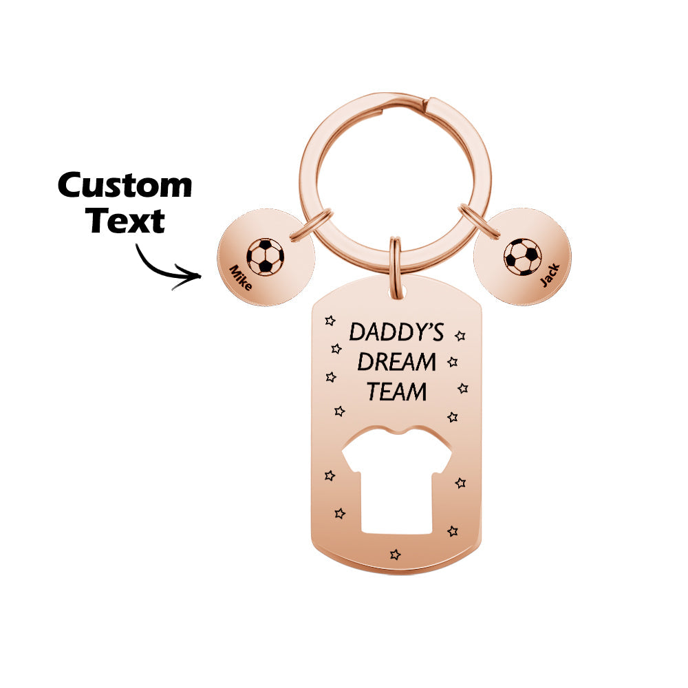Side angle of 'Daddy's Dream Team' football keyring showing depth of engravings and brushed stainless steel finish – perfect engraved gift