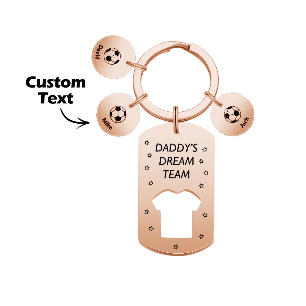 Engraved 'Daddy's Dream Team' keyring displayed in a gift-ready setting to highlight personalised message and stainless steel quality