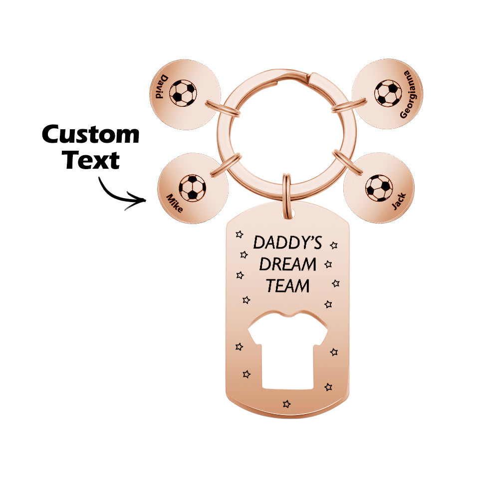 High-resolution detail of hand-stamped lettering on a personalised 'Daddy's Dream Team' name bar – handcrafted engraved gift