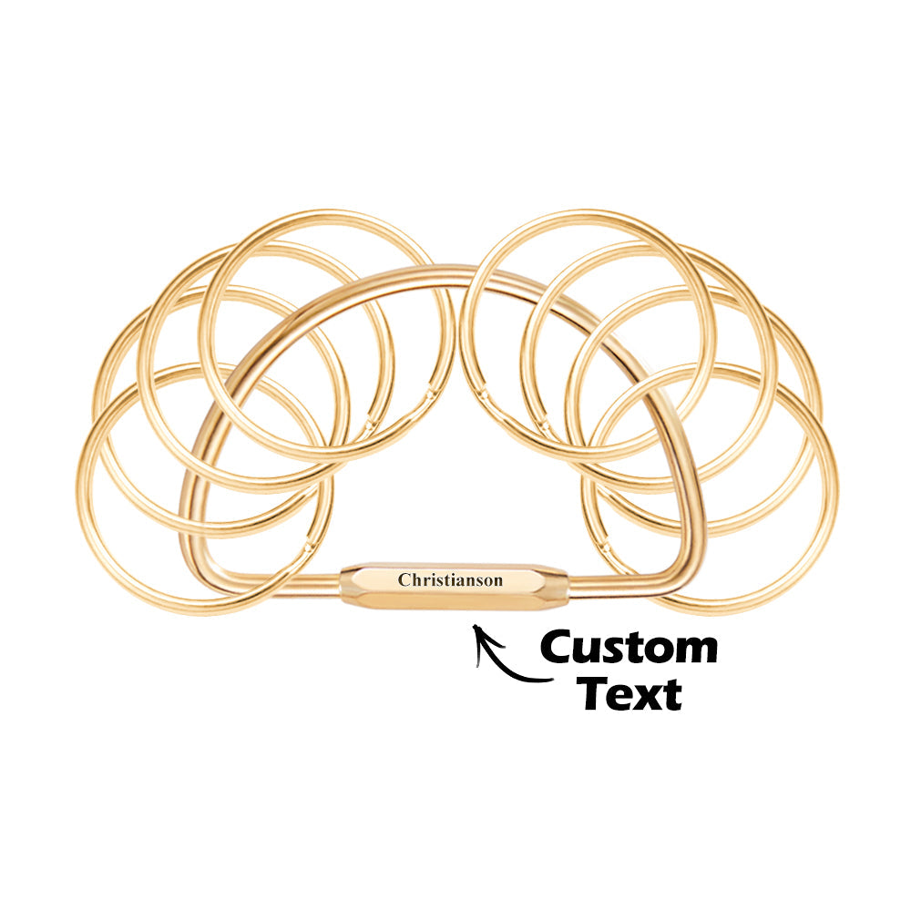 Examples of custom text and font options on a multi-layer brass keyring — choose names, dates or short quotes for your bespoke engraved keychain.