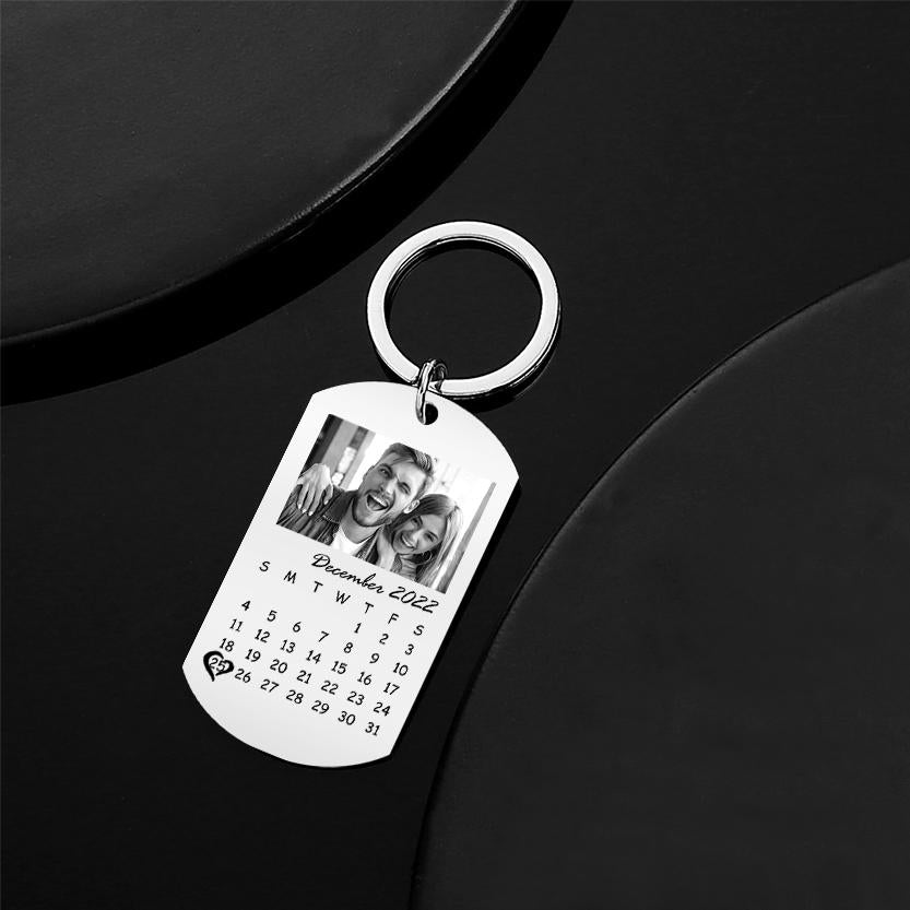 Close-up of the mini calendar plate on a Custom Black Filter Photo Calendar Keyring showing selectable date and neat engraved typography — a personalised keepsake.