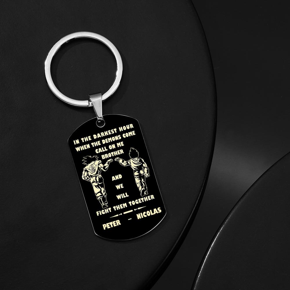 Macro view of the split-ring and tag joint demonstrating sturdy build quality of the Call On Me Brother keyring.