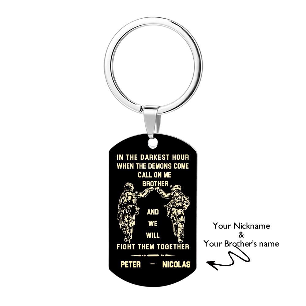 Keyring pictured as a bag tag attached to a leather bag — personalised stainless steel engraved tag ideal as a thoughtful accessory.