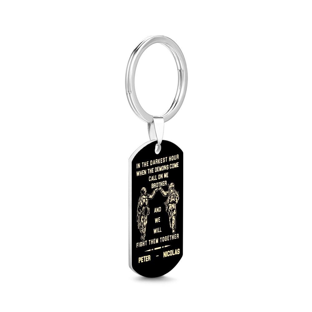 Minimalist shot of engraved tag keyring on a neutral background emphasising the clean lines and personalised engraving.