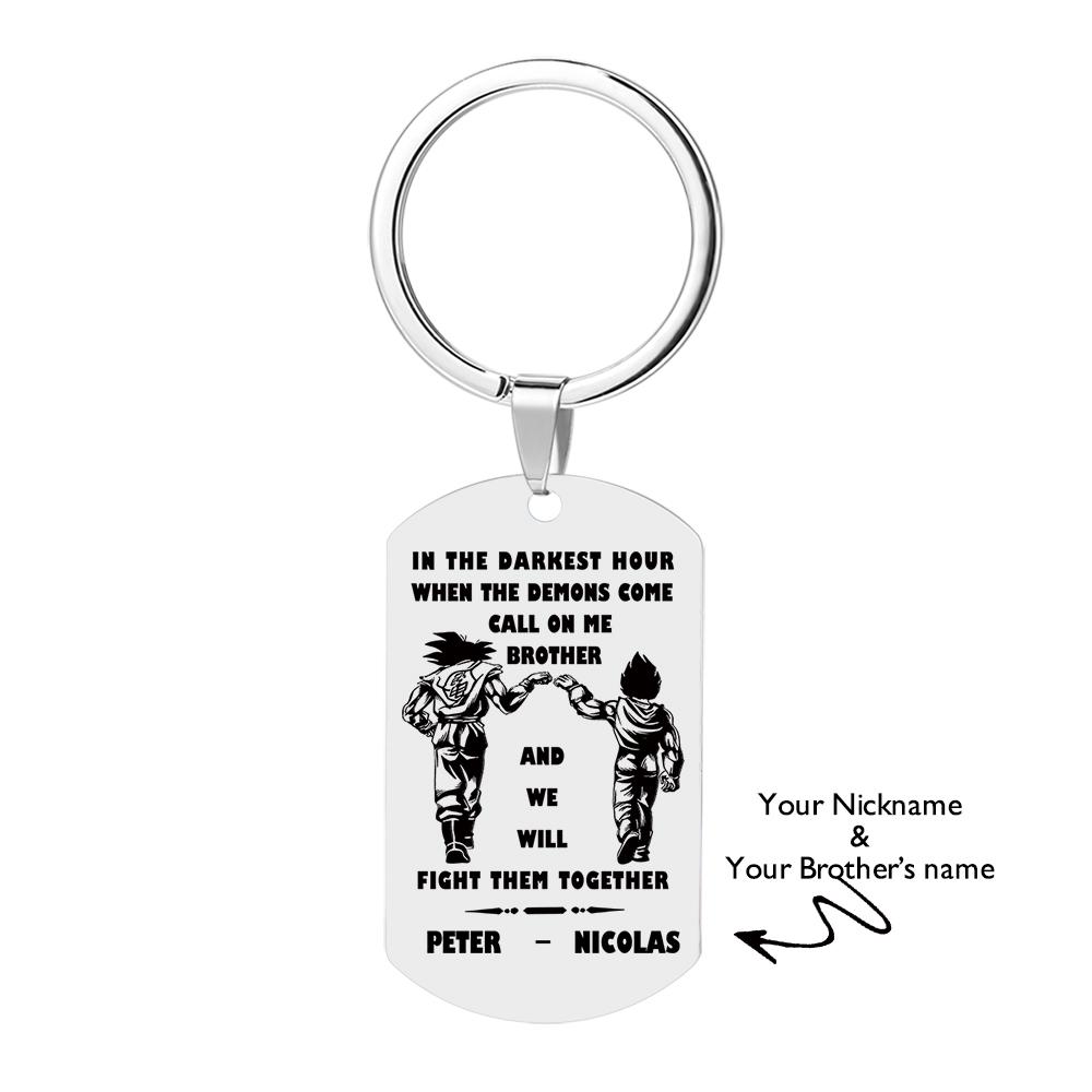 Angled view highlighting the brushed stainless texture and precision engraving on the Call On Me Brother personalised tag keyring.