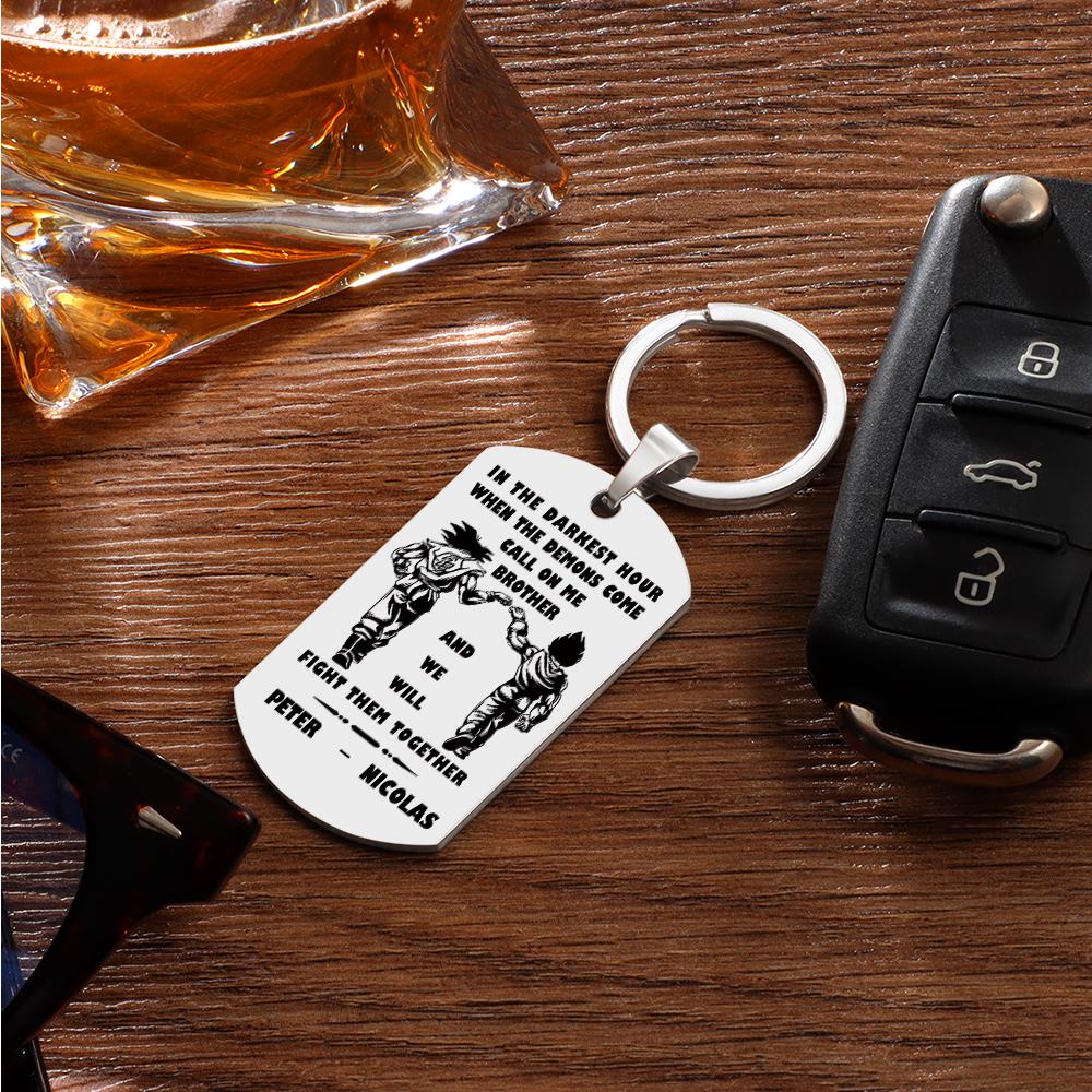 Detailed shot of engraved lettering and edge finishing on a stainless steel tag keyring — high-quality personalisation example.