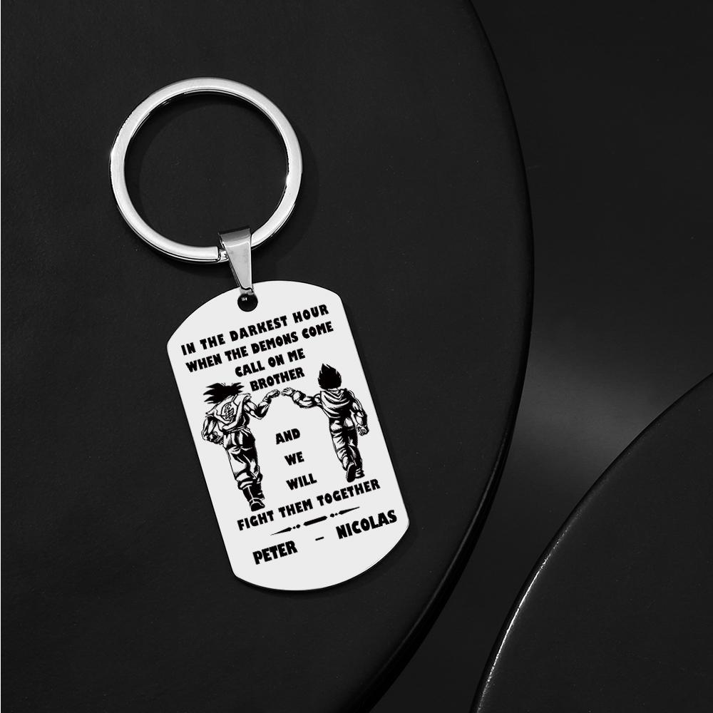 Styled arrangement showing the Call On Me Brother engraved tag alongside a pen and keys — everyday personalised keyring idea.