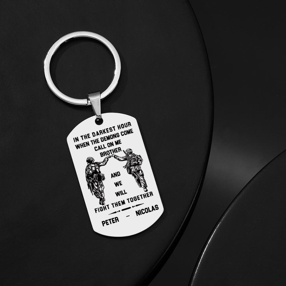 Studio shot emphasising the smooth finish and readable engraving on the personalised Call On Me Brother keyring.