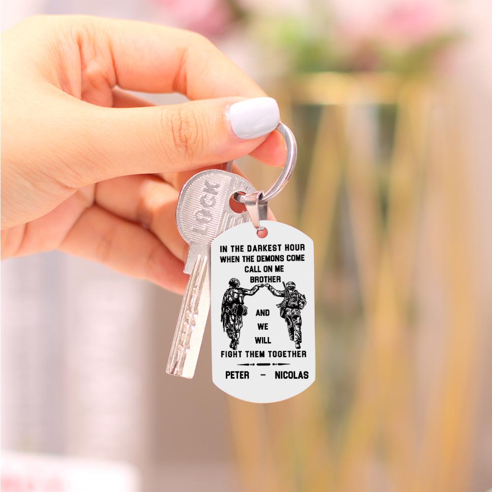 Angled detail of the engraved message and brushed metal texture — robust, everyday personalised keyring gift idea.