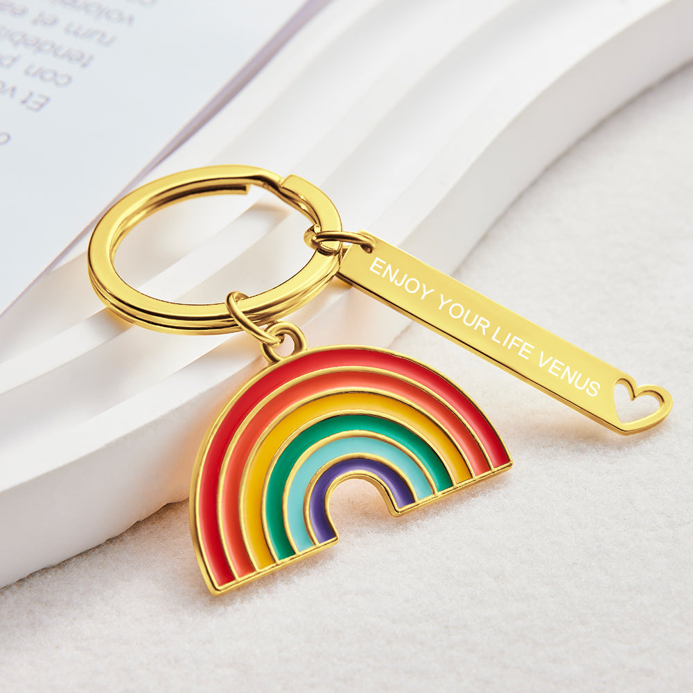 Personalised gold rainbow pendant keyring on white background – bedazzled alloy with gold finish, engraved keyring gift for him or her