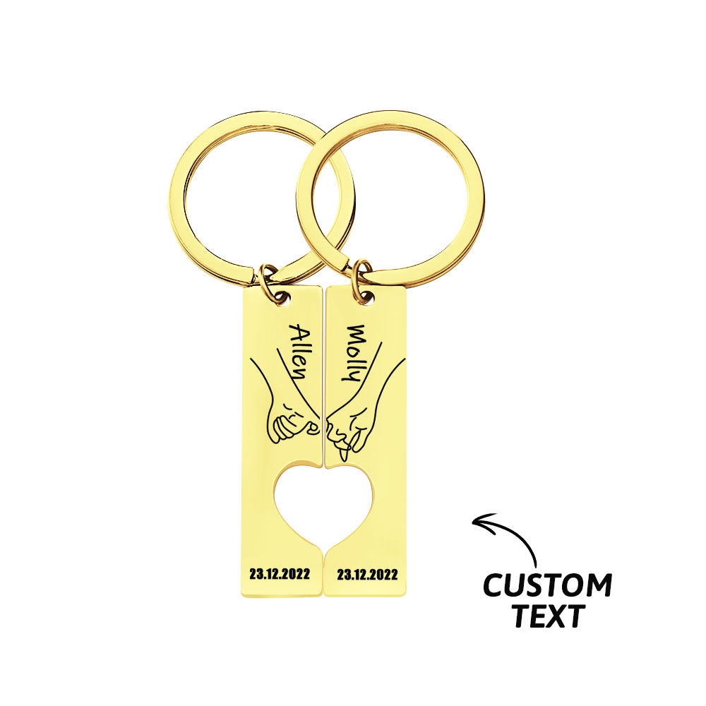 Two matching heart keychains showing personalised date engraving durable stainless steel keepsake