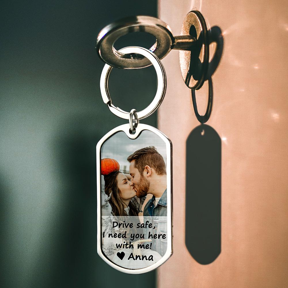 Close-up of personalised metal keyring showing high‑resolution photo insert and decorative 'Drive Safe' text — personalised photo keyring for couples