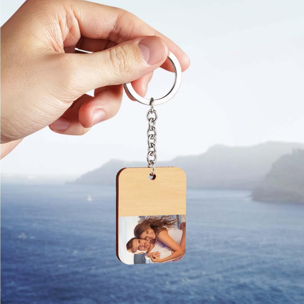 Personalised wooden photo keyring on keys and a bag, lightweight everyday accessory with custom engraved name and photo keepsake