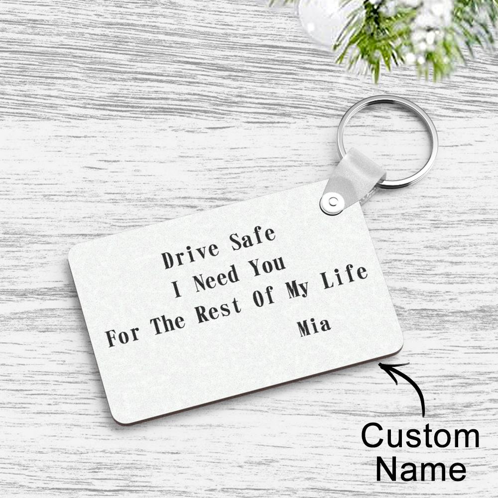 Custom engraved keychain attached to car keys — a personalised safe driving reminder and comforting couple gift for daily commutes