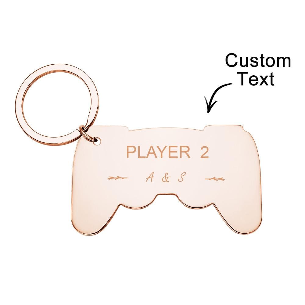 Close-up of engraved gamepad charm showing detailed controller buttons and custom name engraving on a personalised gamer keychain