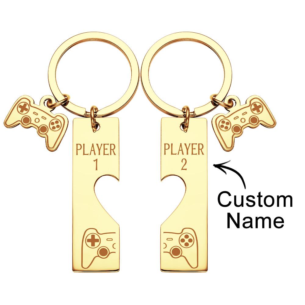 Two personalised retro console keyrings side-by-side with metal split rings — matching couple keyrings, ideal anniversary gift