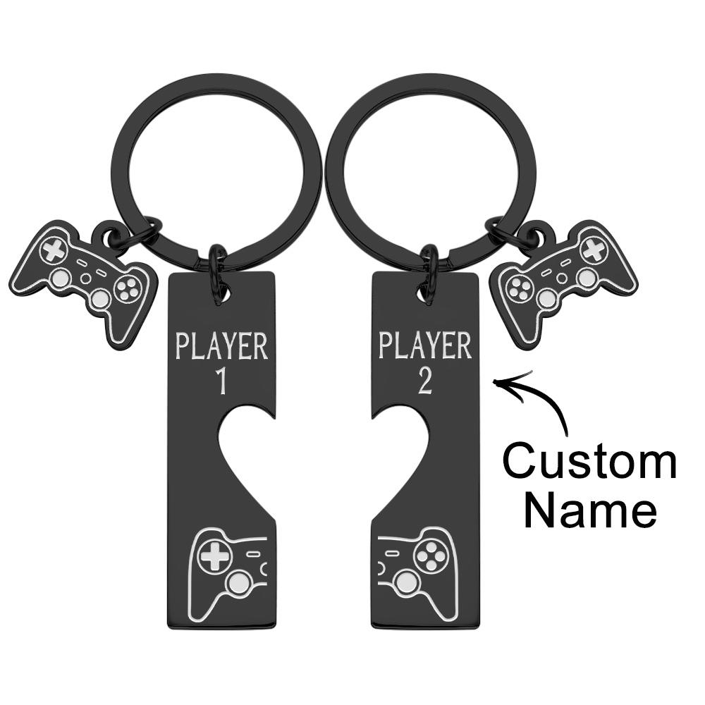 Personalised game console keyring attached to keys and bag — romantic keepsake and practical engraved keyring for couples