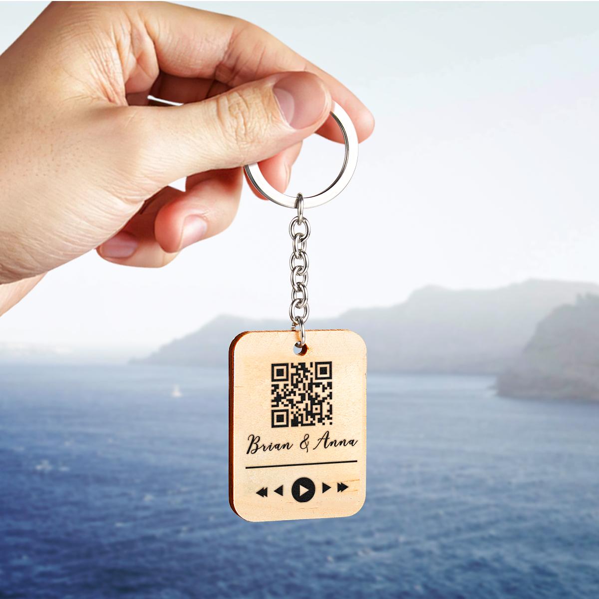 Personalised wooden QR code keychain on keys, showing everyday use as a custom engraved gift for her, teacher or graduate