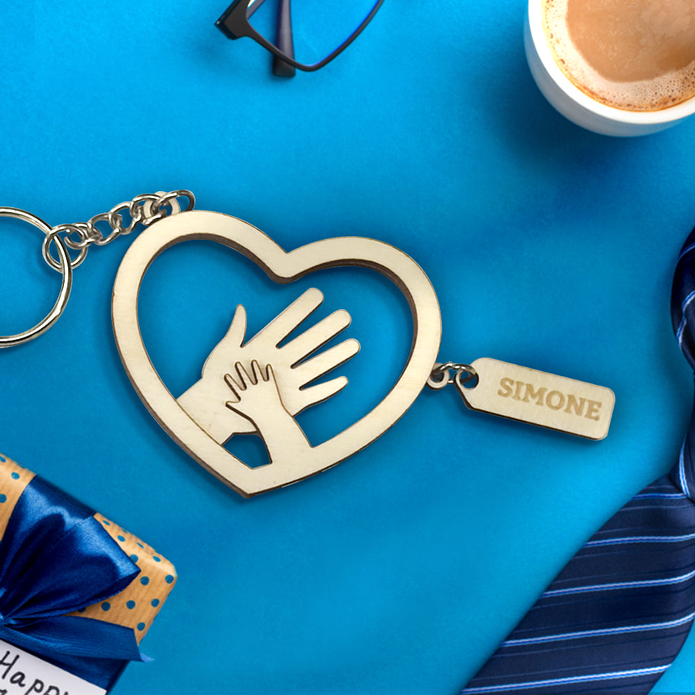 Personalised hands keychain attached to a set of keys showing engraved name tags – durable, everyday accessory and thoughtful Father's Day present