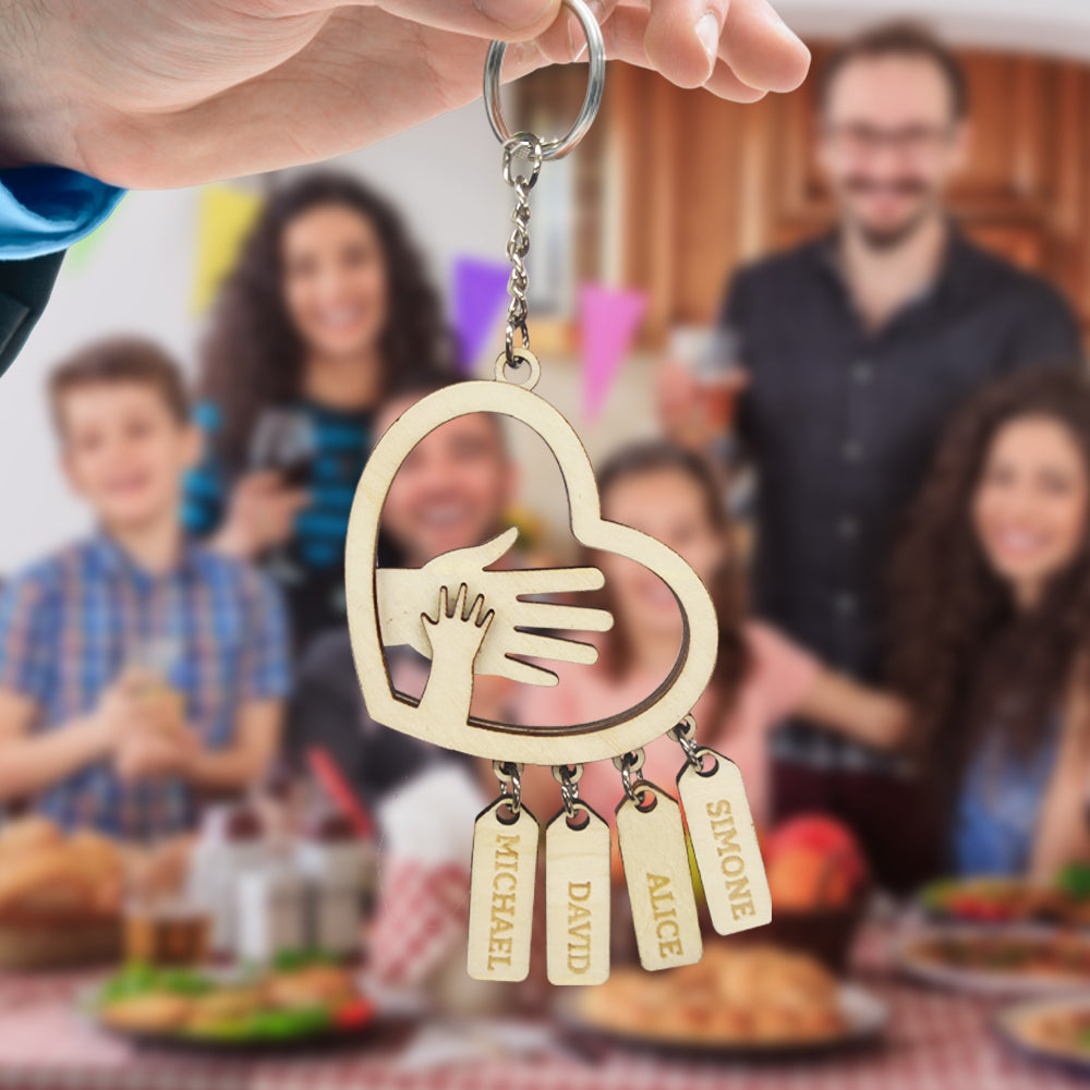 Several personalised hands name tags arranged on a ring to show font, spacing and customisation possibilities – thoughtful personalised gift for grandad or dad