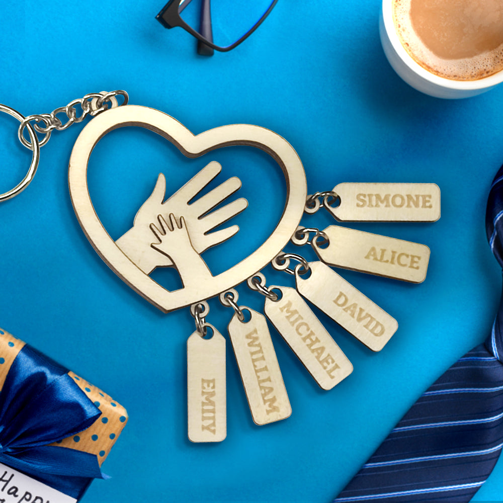 Gold-finish personalised hands name tag with clear engraved names – elegant custom 1–7 names keyring suitable as a Father's Day present