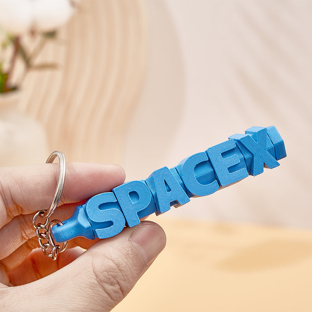 Assorted 3D printed personalised name keychains displayed together – colourful custom name tags, ideal personalised gifts